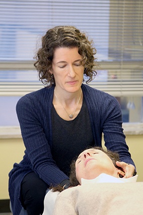 Dr. Weinstock demonstrating approach with patient